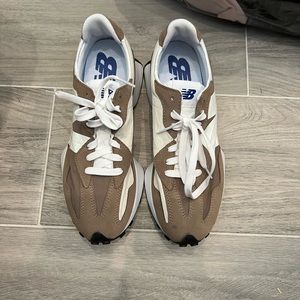 Never worn new balance. Small spot on right front toe